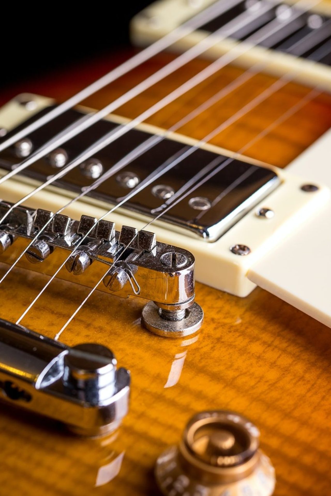 close-up-of-music-guitar-e1648447296348.jpg